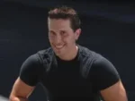 smiling bias black shirt